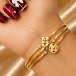 Multi Charm Design Bangle – Stainless Steel Gold Tone