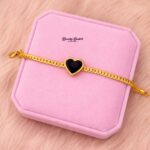 gold chain bracelet with black heart charm elegant jewelry