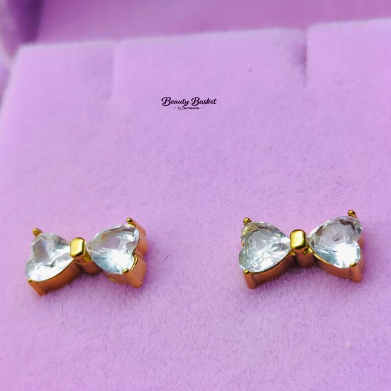 bow crystal stud earrings stainless steel gold tone close view