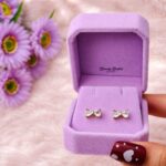 bow crystal stud earrings stainless steel gold tone full view