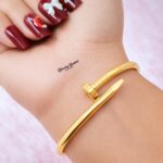 classic nail design bangle stainless steel gold tone full view