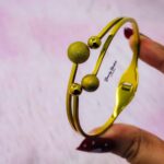 double ball design bangle stainless steel gold tone close view