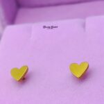 heart stud earrings stainless steel gold tone close view