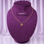 gold tone heart pendant necklace with love text full view