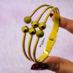 multi ball design bangle stainless steel gold tone close view