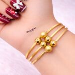 multi ball design bangle stainless steel gold tone full view