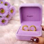 twist texture hoop earrings stainless steel gold tone full view