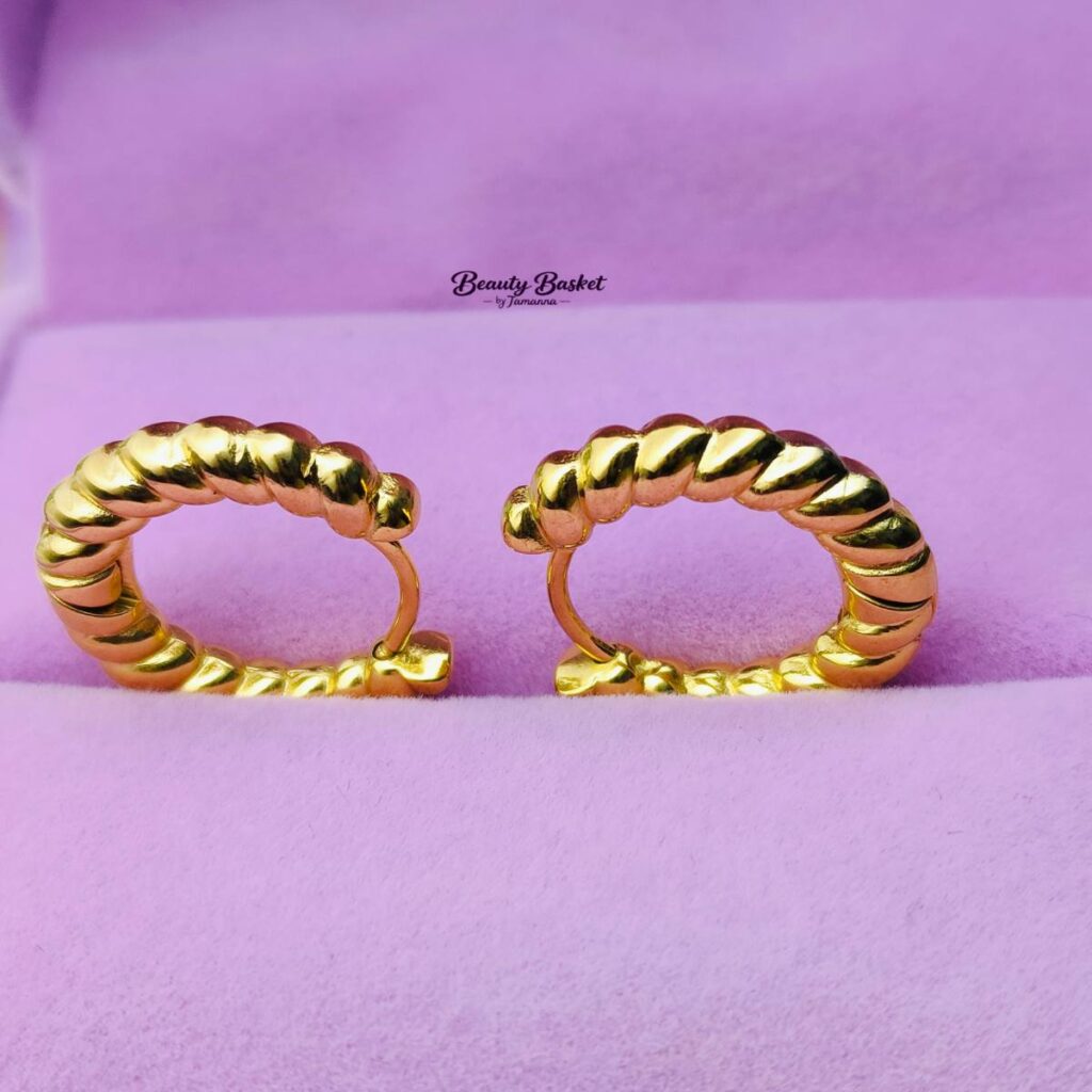 twisted rope hoop earrings stainless steel gold tone close view