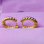 twisted rope hoop earrings stainless steel gold tone close view
