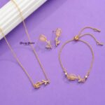 rose design jewelry set gold tone necklace earrings bracelet floral crystal close view